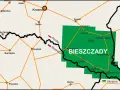Mapa drogowa Bieszczad, województwo podkarpackie. Zaznaczone miasta: Sanok, Lesko, Ustrzyki Dolne, Wetlina, Cisna. Granice z Polską, Słowacją i Ukrainą.